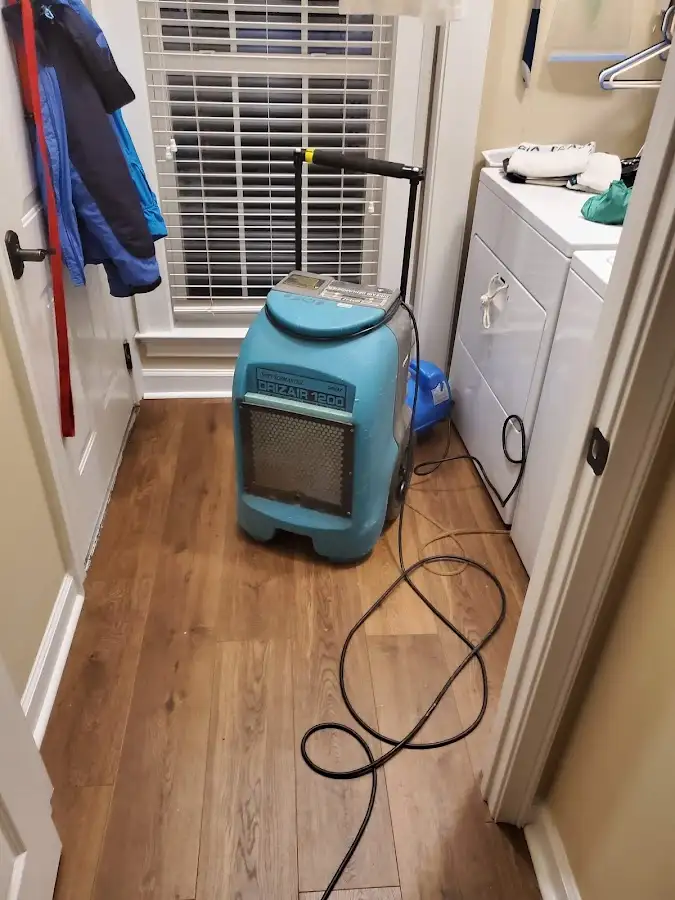 Commercial dehumidifier deployed for Flood Damage Cleanup in Westbury